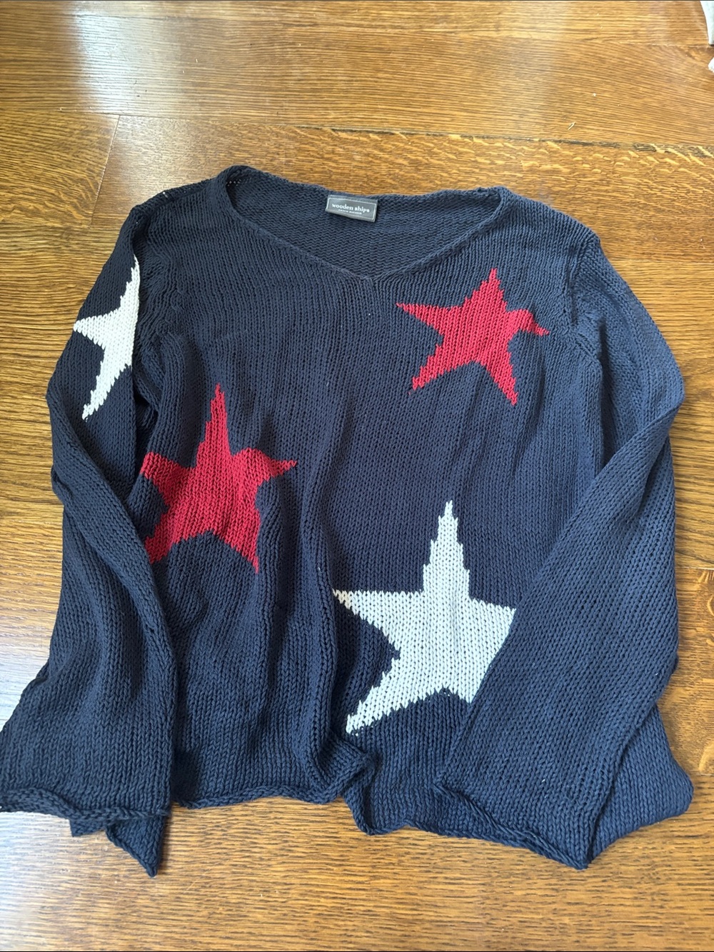 Wooden Ships Navy V-Neck Sweater with Red & White Stars